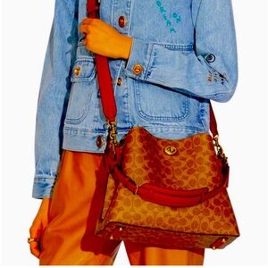 COACH Willow Signature
Coated Canvas Shoulder Bag